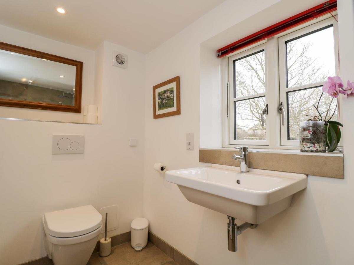 High Cogges Farm Holiday Cottages 威特尼 外观 照片