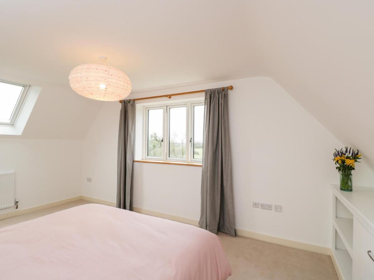 High Cogges Farm Holiday Cottages 威特尼 外观 照片
